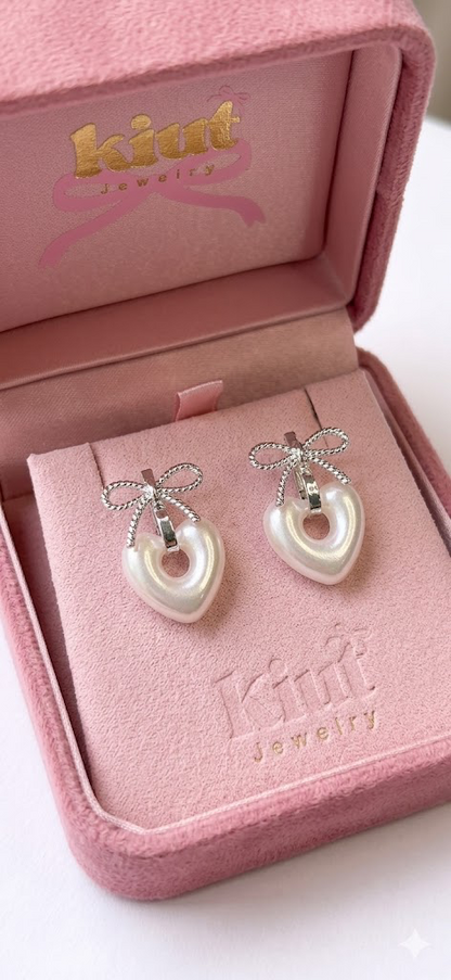 Aretes Cowhite